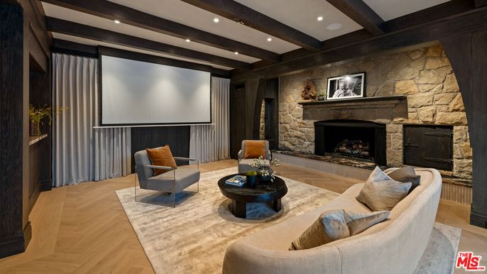 Fireplace, Interior, Living room, Projection Screen, Recessed Lighting, Stone Walls, Wooden Beams, Wood Texture Flooring