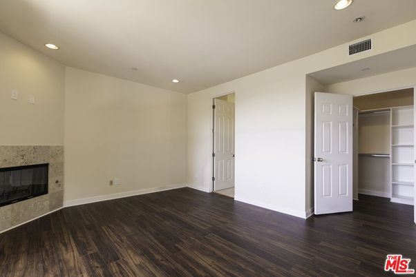 Empty room, Fireplace, Interior, Recessed Lighting, Wood Texture Flooring