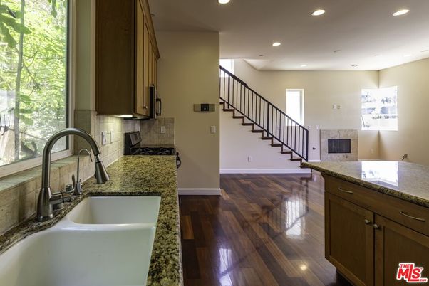 Fireplace, Interior, Kitchen, Recessed Lighting, Wood Texture Flooring
