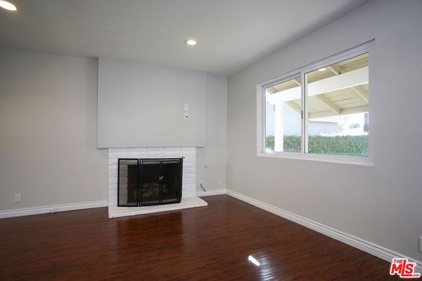 Empty room, Fireplace, Interior, Recessed Lighting, Wood Texture Flooring