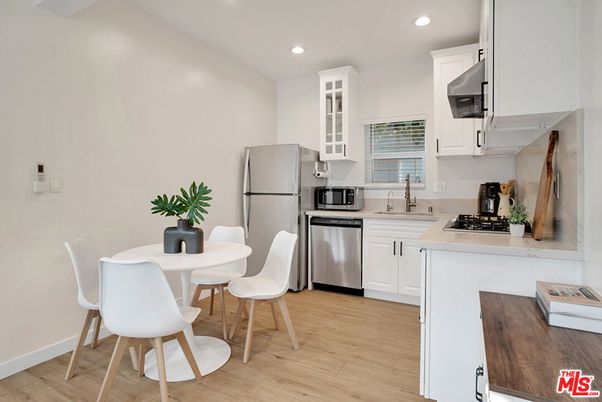 Dining room, Interior, Kitchen, Recessed Lighting, Stainless Steel Appliances, Wood Texture Flooring