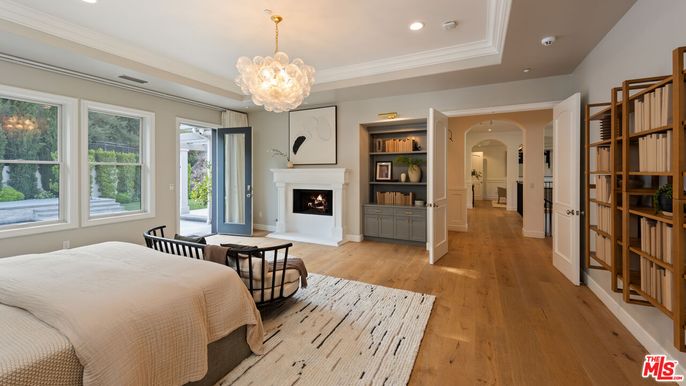 Bedroom, Chandelier, Fireplace, Interior, Recessed Lighting, Wood Texture Flooring