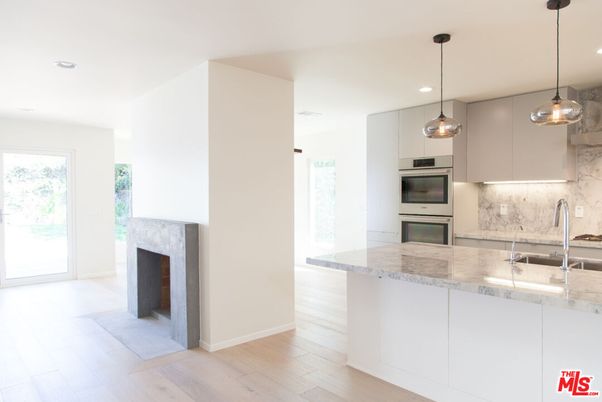Fireplace, Interior, Kitchen, Pendant Lights, Recessed Lighting, Stainless Steel Appliances, Wood Texture Flooring