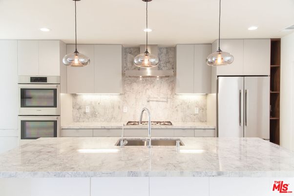 Interior, Kitchen, Marble Walls, Pendant Lights, Recessed Lighting, Stainless Steel Appliances