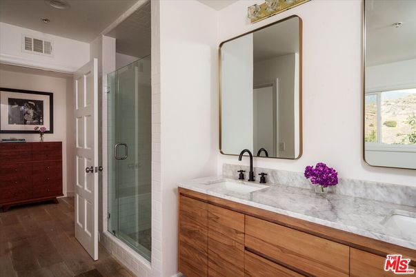 Bathroom, Dual Sink Vanities, Glass Shower, Interior, Wood Texture Flooring