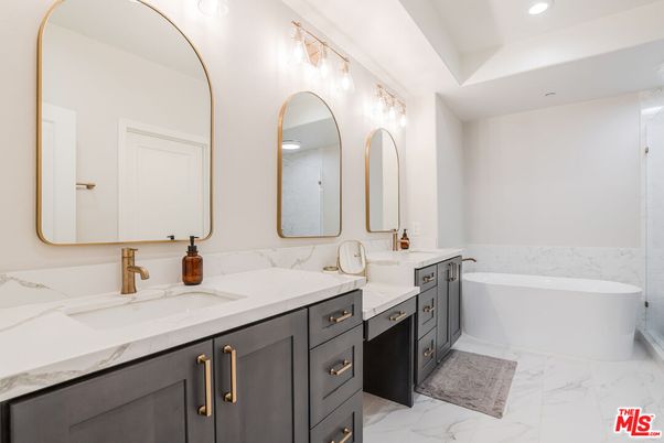 Bathroom, Dual Sink Vanities, Free Standing Baths, Interior, Marble, Marble Walls, Recessed Lighting