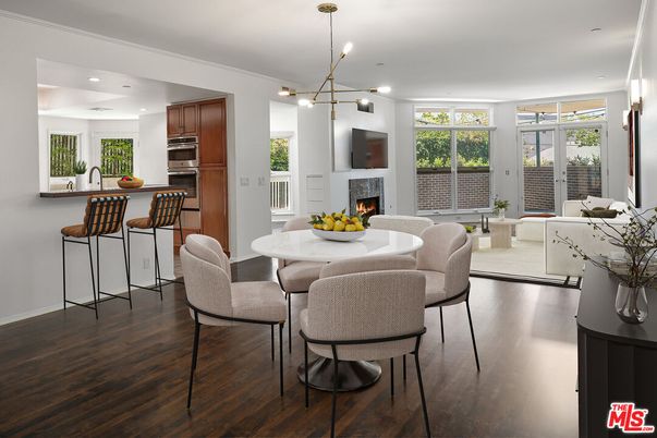 Dining room, Fireplace, Interior, Kitchen, Living room, Pendant Lights, Recessed Lighting, Stainless Steel Appliances, Wood Texture Flooring