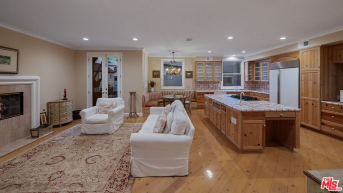 Dining room, Fireplace, Interior, Kitchen, Living room, Pendant Lights, Recessed Lighting, Tile Countertops, Wood Texture Flooring