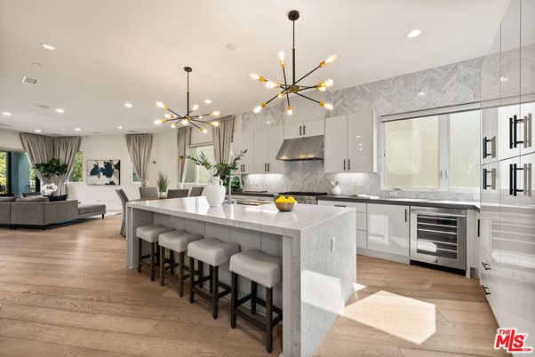Interior, Kitchen, Marble Walls, Pendant Lights, Recessed Lighting, Stainless Steel Appliances, Wood Texture Flooring