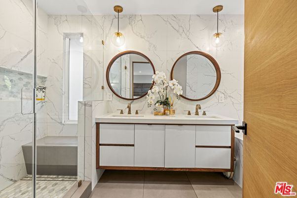 Bathroom, Dual Sink Vanities, Glass Shower, Interior, Marble Walls, Pendant Lights