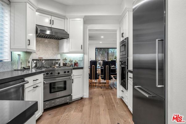 Dining room, Interior, Kitchen, Recessed Lighting, Stainless Steel Appliances, Wood Texture Flooring