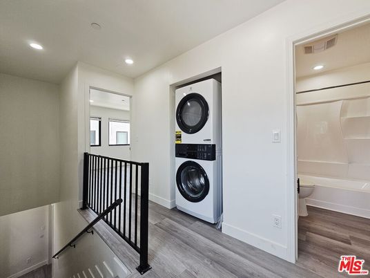 Bathroom, Interior, Recessed Lighting, Utility Closets, Washer, Wood Texture Flooring