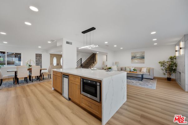 Dining room, Interior, Kitchen, Living room, Pendant Lights, Recessed Lighting, Stainless Steel Appliances, Wood Texture Flooring