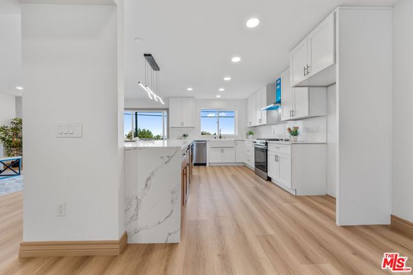 Interior, Kitchen, Marble Walls, Pendant Lights, Recessed Lighting, Wood Texture Flooring