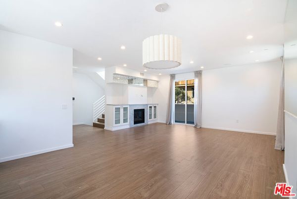 Empty room, Fireplace, Interior, Pendant Lights, Recessed Lighting, Wood Texture Flooring