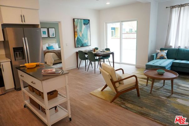 Dining room, Interior, Kitchen, Recessed Lighting, Stainless Steel Appliances, Wood Texture Flooring