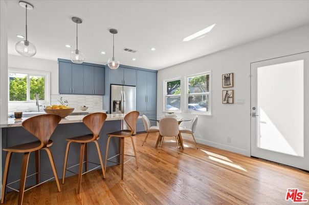 Dining room, Interior, Kitchen, Pendant Lights, Recessed Lighting, Stainless Steel Appliances, Wood Texture Flooring