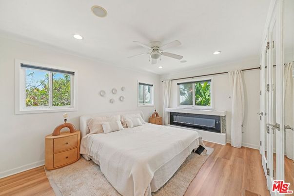 Bedroom, Fireplace, Interior, Recessed Lighting, Wood Texture Flooring