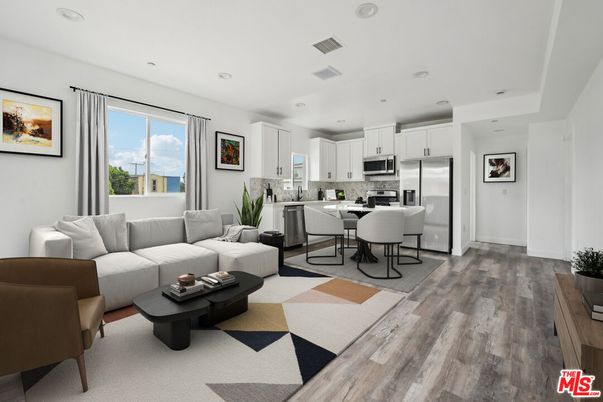 Dining room, Interior, Kitchen, Living room, Recessed Lighting, Stainless Steel Appliances, Wood Texture Flooring