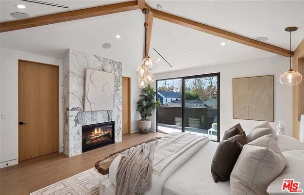 Bedroom, Fireplace, Interior, Marble Walls, Pendant Lights, Recessed Lighting, Wood Texture Flooring