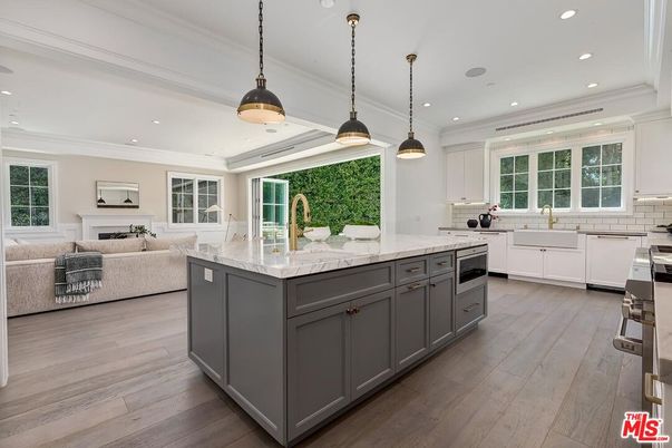 Fireplace, Interior, Kitchen, Living room, Pendant Lights, Recessed Lighting, Stainless Steel Appliances, Wood Texture Flooring