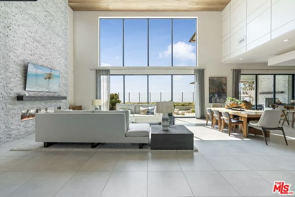 Dining room, Fireplace, Interior, Living room, Recessed Lighting, Stone Walls, Water