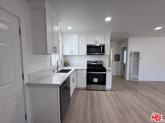 Interior, Kitchen, Recessed Lighting, Stainless Steel Appliances, Wood Texture Flooring