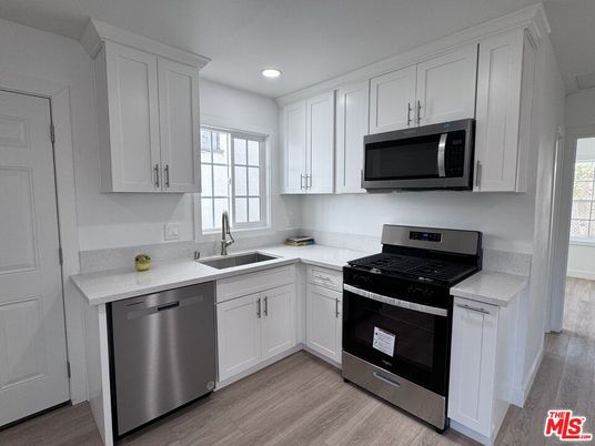 Interior, Kitchen, Recessed Lighting, Stainless Steel Appliances, Wood Texture Flooring