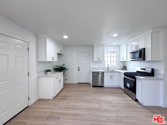 Interior, Kitchen, Recessed Lighting, Stainless Steel Appliances, Wood Texture Flooring