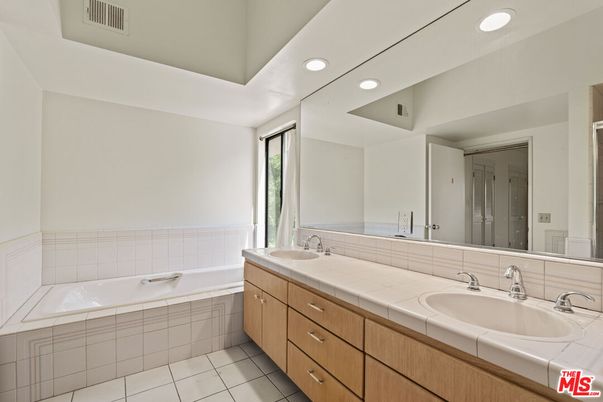 Bathroom, Dual Sink Vanities, Interior, Recessed Lighting, Tile Countertops