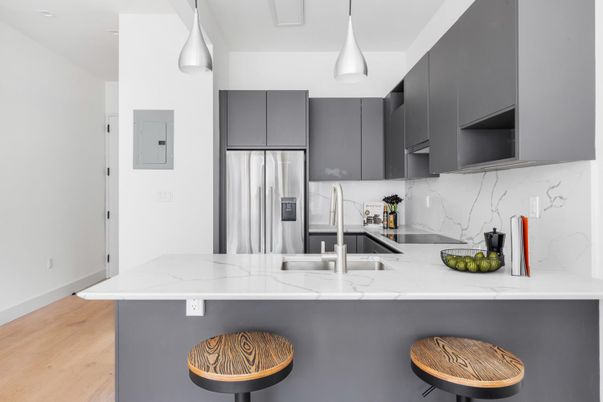 Interior, Kitchen, Marble Walls, Pendant Lights, Stainless Steel Appliances, Wood Texture Flooring