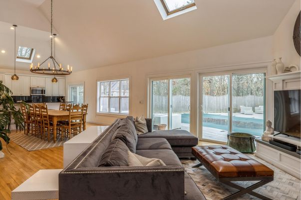 Chandelier, Dining room, Fireplace, Interior, Kitchen, Living room, Pendant Lights, Wood Texture Flooring