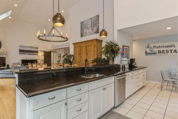 Chandelier, Fireplace, Interior, Kitchen, Pendant Lights, Recessed Lighting, Stainless Steel Appliances, Wood Texture Flooring