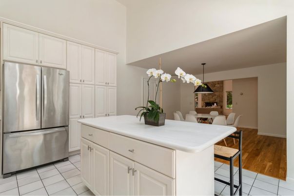 Dining room, Fireplace, Interior, Kitchen, Pendant Lights, Stainless Steel Appliances, Wood Texture Flooring