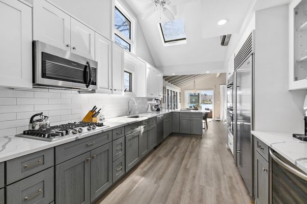 Interior, Kitchen, Pendant Lights, Recessed Lighting, Stainless Steel Appliances, Wood Texture Flooring