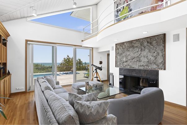 Fireplace, Interior, Living room, Recessed Lighting, Water, Wood Texture Flooring