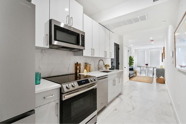 Dining room, Interior, Kitchen, Marble, Marble Walls, Recessed Lighting, Stainless Steel Appliances