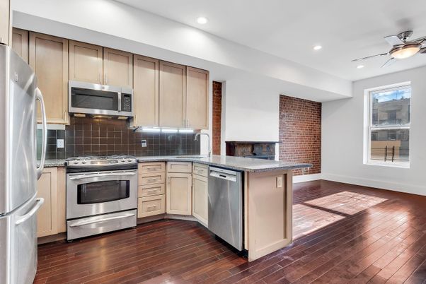 Interior, Kitchen, Recessed Lighting, Stainless Steel Appliances, Stone Walls, Wood Texture Flooring