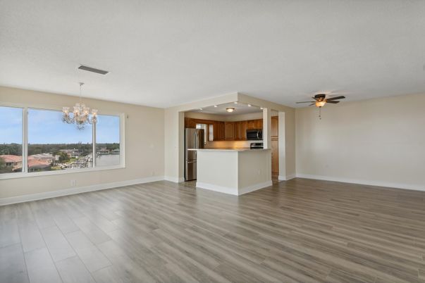 Chandelier, Empty room, Interior, Kitchen, Stainless Steel Appliances, Wood Texture Flooring