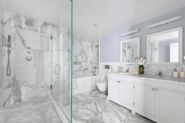Bathroom, Dual Sink Vanities, Glass Shower, Interior, Marble, Marble Walls, Recessed Lighting