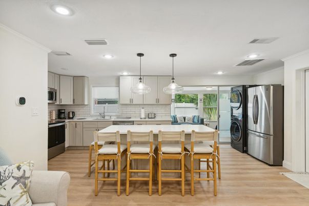 Interior, Kitchen, Pendant Lights, Recessed Lighting, Stainless Steel Appliances, Washer, Wood Texture Flooring
