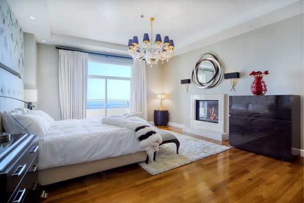 Bedroom, Chandelier, Fireplace, Interior, Recessed Lighting, Wood Texture Flooring