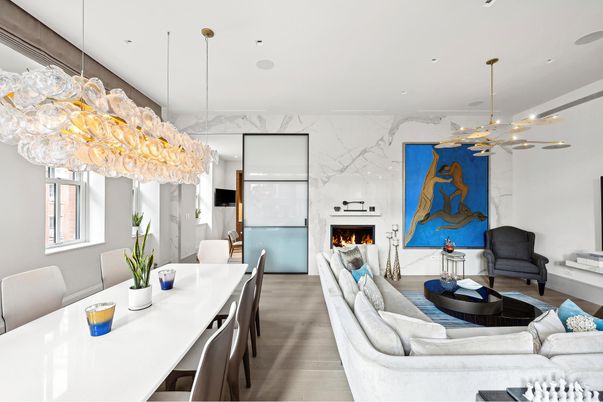 Dining room, Fireplace, Interior, Living room, Marble Walls, Pendant Lights, Recessed Lighting, Wood Texture Flooring