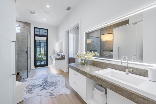 Bathroom, Dual Sink Vanities, Glass Shower, Interior, Pendant Lights, Recessed Lighting, Wood Texture Flooring