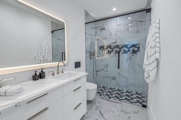 Bathroom, Dual Sink Vanities, Glass Shower, Interior, Marble, Marble Walls, Recessed Lighting