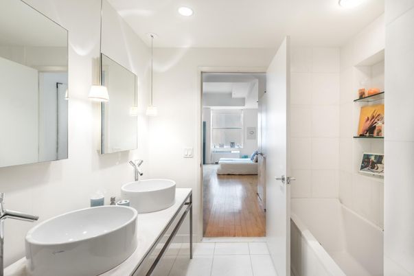 Bathroom, Dual Sink Vanities, Interior, Recessed Lighting, Wood Texture Flooring