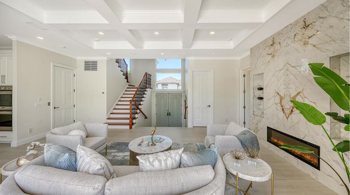 Fireplace, Interior, Living room, Marble Walls, Recessed Lighting, Wood Texture Flooring