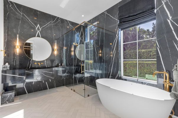 Bathroom, Dual Sink Vanities, Free Standing Baths, Glass Shower, Interior, Marble Walls, Recessed Lighting