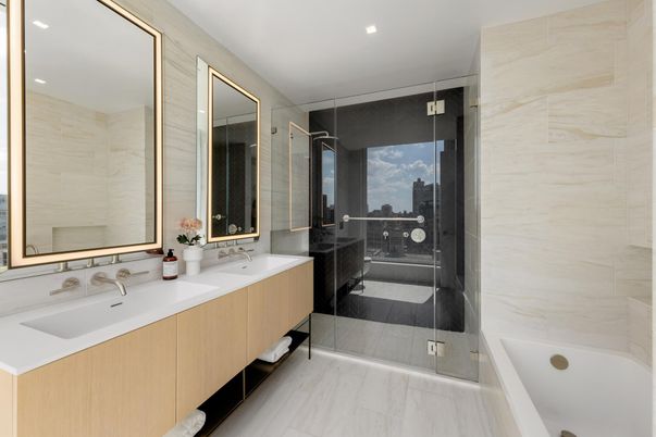 Bathroom, Dual Sink Vanities, Glass Shower, Interior, Marble, Marble Walls, Recessed Lighting, Wood Texture Flooring