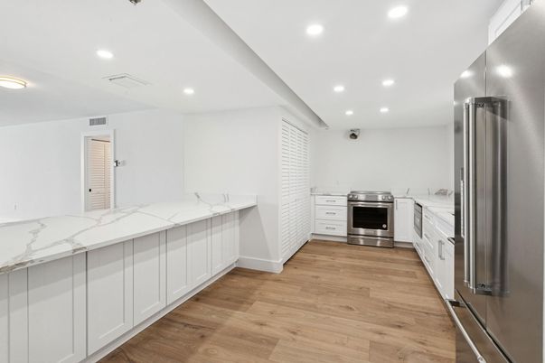 Interior, Kitchen, Recessed Lighting, Stainless Steel Appliances, Wood Texture Flooring